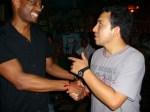 An salsa dancer telling my friend that he was impressed by his salsa.